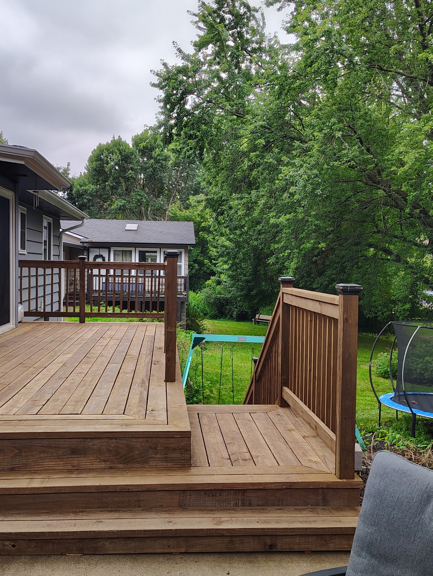 Stained cedar deck with steps and landing